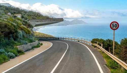 Sardinia, dreamlike coastal road by the sea, bridge projection, Villanova Monteleone, Europe,