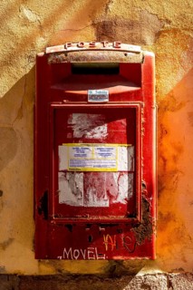 Sardinia, red letterbox on orange house wall, Bosa, Europe, Province of Oristano, Italy,