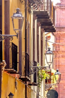 Sardinia, house wall with picturesque alleyway lamps, Bosa, Europe, Province of Oristano, Italy,