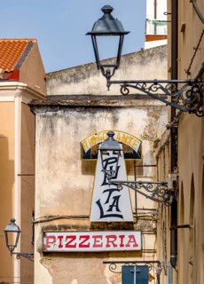 Sardinia, Ristorante Pizzeria sign, streetlamp on house wall, old town, Alghero, Europe, province
