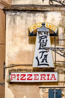 Sardinia, Ristorante Pizzeria sign, street lamp on house wall, old town, Alghero, Europe, province