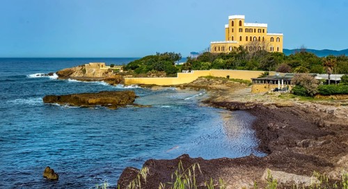 Sardinia, coastal wall, coast and beach with Villa Las Tronas Hotel and Spa, Alghero, Europe,