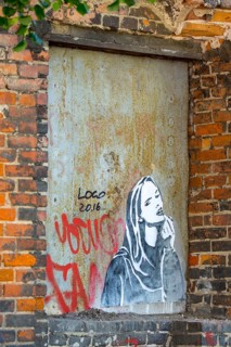 Grafitti with young woman, street scene, GdaÅsk, Gdansk, Baltic Sea coast, Baltic Sea, pomorskie,