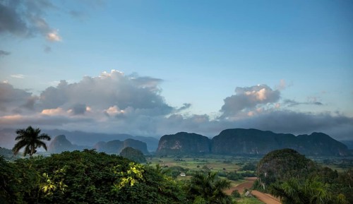 Tobacco fields and the mountains of the Mogotes, Viñales valley with karst mountains, Viñales,