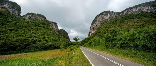 Country road with central reservation in the Vinales Valley, Viñales, Cuba, Pinar del Río, Cuba