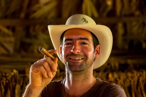 Tobacco farmer, tobacco farmer Luis Manne Alvares Rodrigues smokes a Havana cigar, tobacco farm in