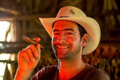 Tobacco farmer, tobacco farmer Luis Manne Alvares Rodrigues smokes a Havana cigar, tobacco farm in