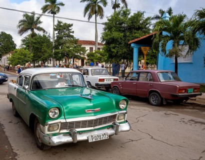 Vintage cars, old road cruisers in Vinales in the Vinales Valley, Cuba, Vinales, Central America,