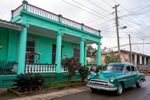 Vintage cars, old road cruisers in Vinales in the Vinales Valley, Cuba, Vinales, Central America,