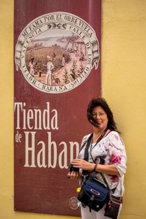 Tobacco poster in front of a Cuban cigar shop, La Habana, Cuba, Caribbean, Central America, Cuba,