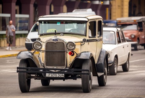 Ford vintage car in street scene, Old American road cruiser on the streets of Havana, Taxi, La