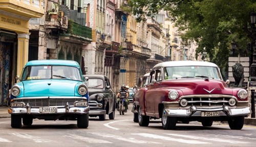 Oldtimer in the street scene, Old American street cruiser on the streets of Havana, Taxi, La