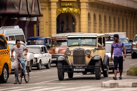 Ford vintage car in street scene, Old American road cruiser on the streets of Havana, Taxi, La