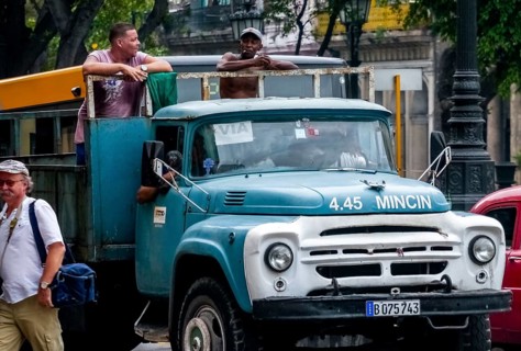 Oldtimer in street view, lorry with workers on the loading area, La Habana, Havana, Cuba, Cuba,