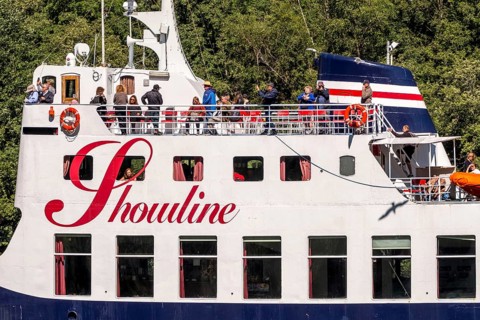 Tourists overdeck on excursion ship Showline, flying mantle liner, fjord, Flåm, Bakka, Sogn og