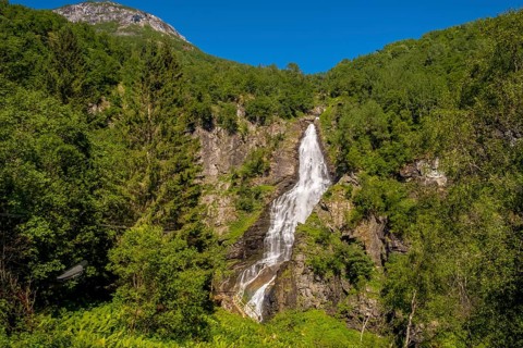 Waterfall near Stahlheim, mountains, baür sky, Skulestadmo, Hordaland, Norway, Scandinavia, Europe,