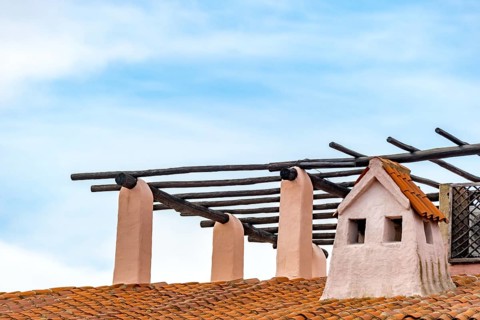 Sardinia, worth seeing harbour town Porto Cervo, roof construction wooden frame on roof with turret