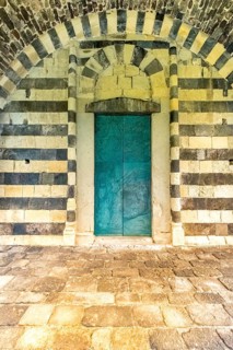 Sardinia, Santissima TrinitÃƒÆ'Ã'Â di Saccargia, Romanesque church with entrance door,