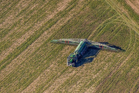 Aerial view, Tractor and agricultural spraying machine on a field, Paradiese, Soest, Soester Börde,