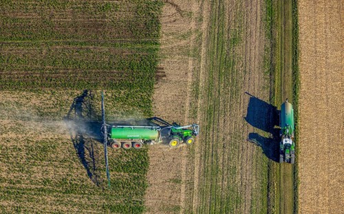 Aerial view, Tractor and agricultural spraying machine on a field, Paradiese, Soest, Soester Börde,