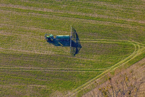 Aerial view, Tractor and agricultural spraying machine on a field, Paradiese, Soest, Soester Börde,