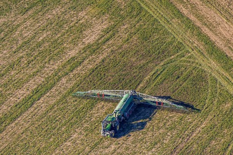 Aerial view, Tractor and agricultural spraying machine on a field, Paradiese, Soest, Soester Börde,