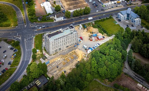 Aerial view, construction site with new hotel building on the corner of Flandersbacher Weg and