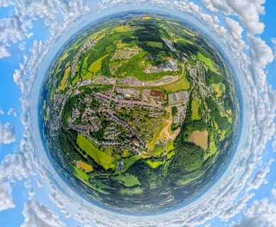 Residential area local view district Oberbonsfeld surrounded by meadows and fields, earth globe,
