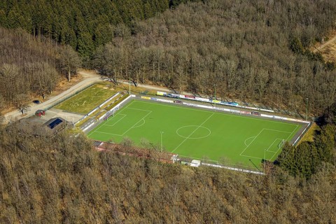 Aerial view, football stadium sports field VSV Wenden 1930 e.V., surrounded by forest, Schönau,