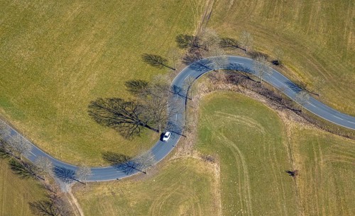 Aerial view, S-curve with cars and trees, shapes and colours, Hubertusstraße, Ottfingen, Wenden,