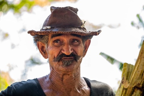 Sugar cane farmer in Valle de los Ingenios, portrait with hat, Trinidad, Cuba, Sancti Spíritus,