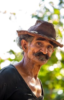 Sugar cane farmer in Valle de los Ingenios, portrait with hat, Trinidad, Cuba, Sancti Spíritus,