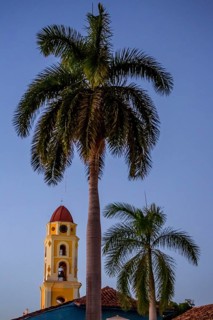 Church Convento de San Francisco de Asis of Trinidad with palm trees in the blue hour, Trinidad,