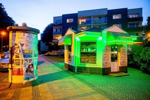Green illuminated kiosk, blue hour, ÅšwinoujÅ'cie, Swinoujscie, Baltic Sea coast, Baltic Sea,
