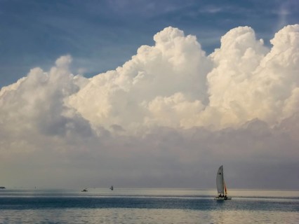 Sailboat with wall of clouds on the beach of Varadero, Cuba, Matanzas, Cuba, Central America