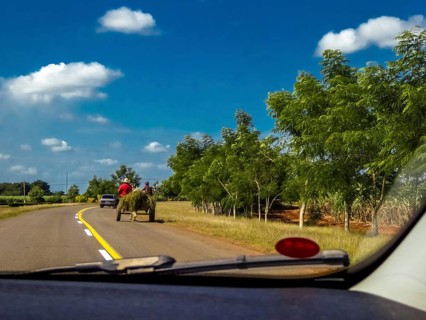 Street scene on the country roads of Yaguanabo with horse-drawn carriage, Yaguanabo, Cuba,