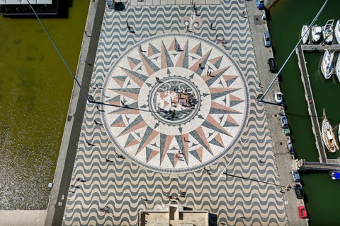 The large compass in the wave pavement in front of the Monumento a Los Descubrimientos, Lisbon,