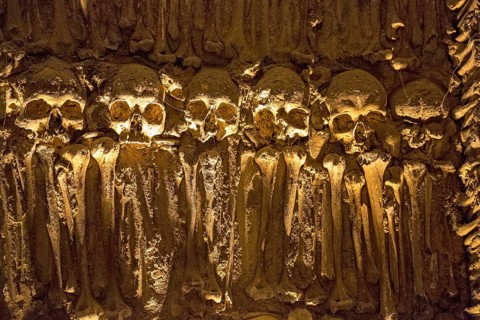Piled bones in the ossuary, Capela dos ossos parede, chapel of bones, bone chapel, ossuary in