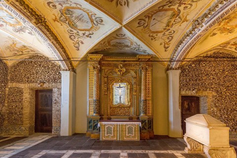 Piled bones in the ossuary, Capela dos ossos parede, chapel of bones, bone chapel, ossuary in