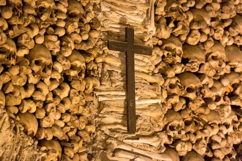 Piled bones in the ossuary, Capela dos ossos parede, chapel of bones, bone chapel, ossuary in