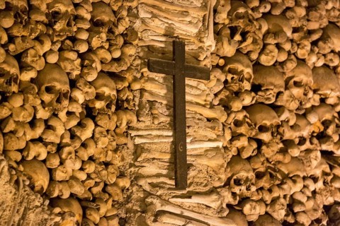 Piled bones in the ossuary, Capela dos ossos parede, chapel of bones, bone chapel, ossuary in