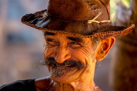 Sugar cane farmer in Valle de los Ingenios, portrait with hat, Trinidad, Cuba, Sancti Spíritus,