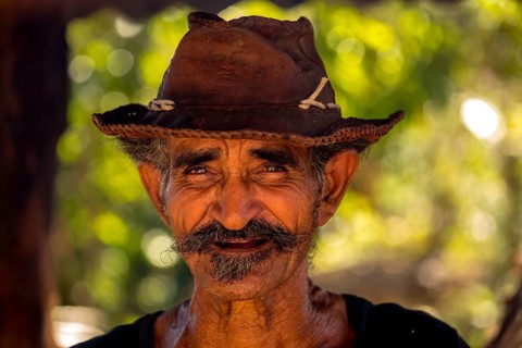 Sugar cane farmer in Valle de los Ingenios, portrait with hat, Trinidad, Cuba, Sancti Spíritus,