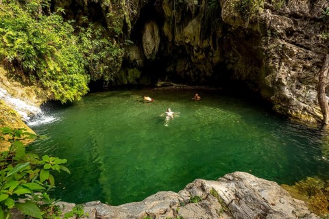 Mountain lake with green water, excursion destination, Valle De Los Ingenios, Cuba, Cuba