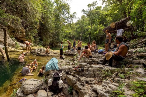 Small bathing lake in the Valle de los Ingenios with tourists, Trinidad, Cuba, Sancti Spíritus,