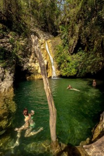Small bathing lake in the Valle de los Ingenios with tourists, Trinidad, Cuba, Sancti Spíritus,