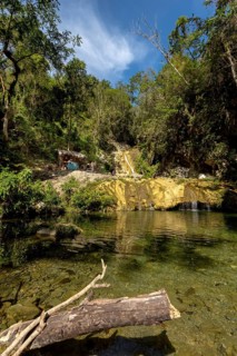 Small bathing lake in the Valle de los Ingenios with tourists, Trinidad, Cuba, Sancti Spíritus,