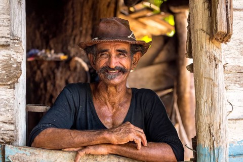 Sugar cane farmer in Valle de los Ingenios, portrait with hat, Trinidad, Cuba, Sancti Spíritus,