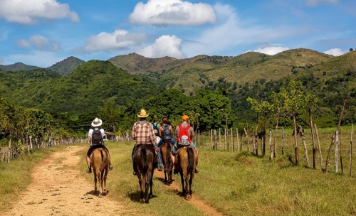 Tourists on horseback in the Valle de los Ingenios, Trinidad, Cuba, Sancti Spíritus, Cuba, Sancti