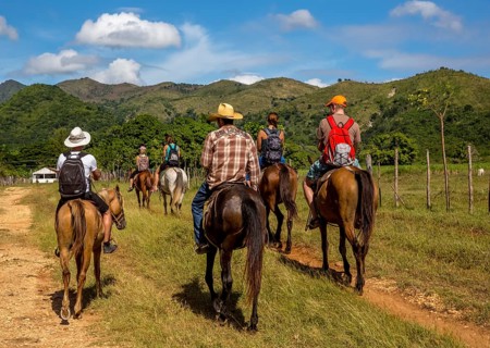 Tourists on horseback in the Valle de los Ingenios, Trinidad, Cuba, Sancti Spíritus, Cuba, Sancti